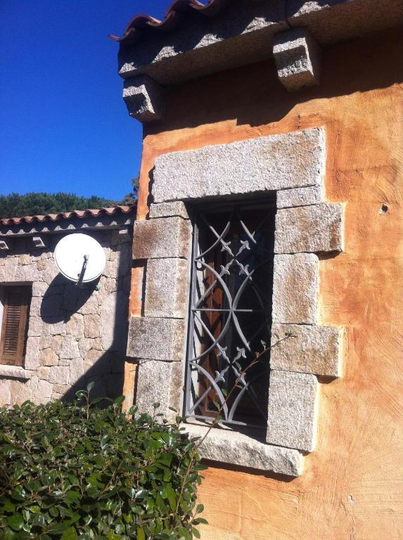 Il Faro San Teodoro Aparthotel Bilik gambar